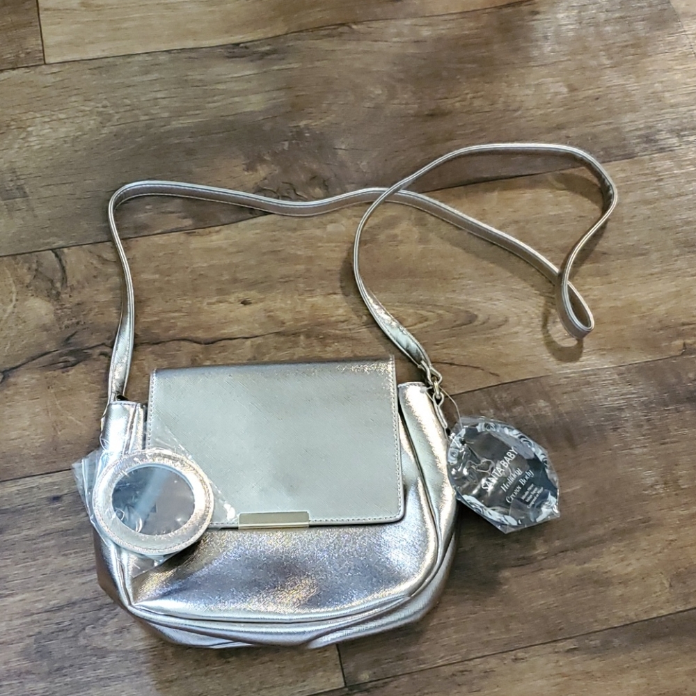 Rose gold color crossbody purse NWT